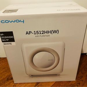 A brand new Coway Airmega AP-1512HH(W).